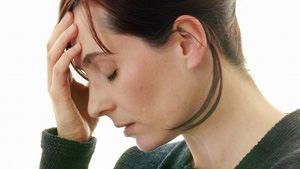 Мигрень может привести к поражениям головного мозга у женщин